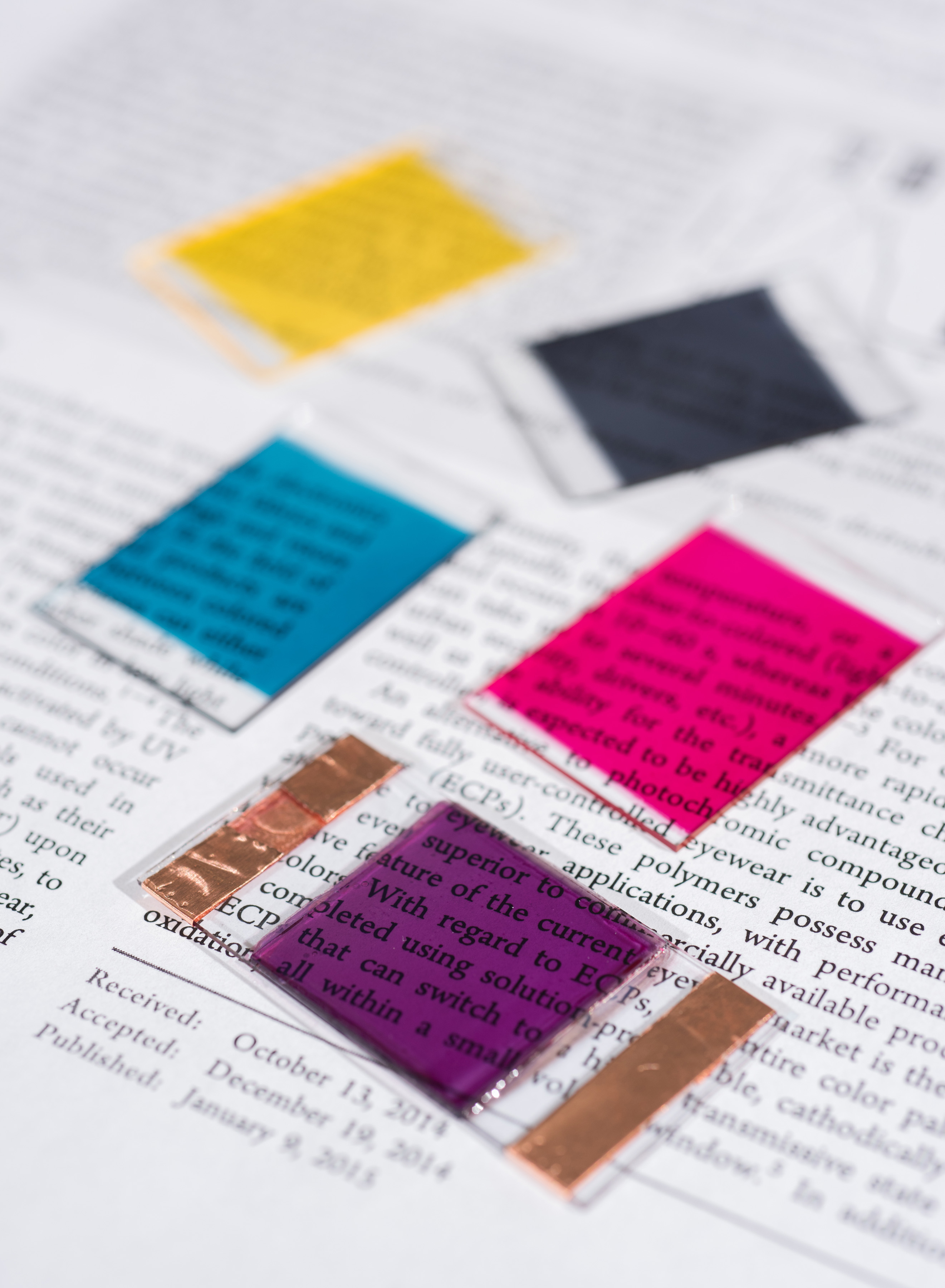 Samples show some of the colors researchers have produced in electrochromic polymers. The materials can be used for applications such as sunglasses and window tinting that can be turned on and off through the application of an electrical potential. (Credit: Rob Felt)