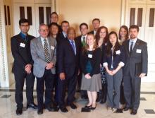 Members of the Sam Nunn Security Program pose with Congressman John Lewis during the group's 2015 spring trip to Washington, D.C.